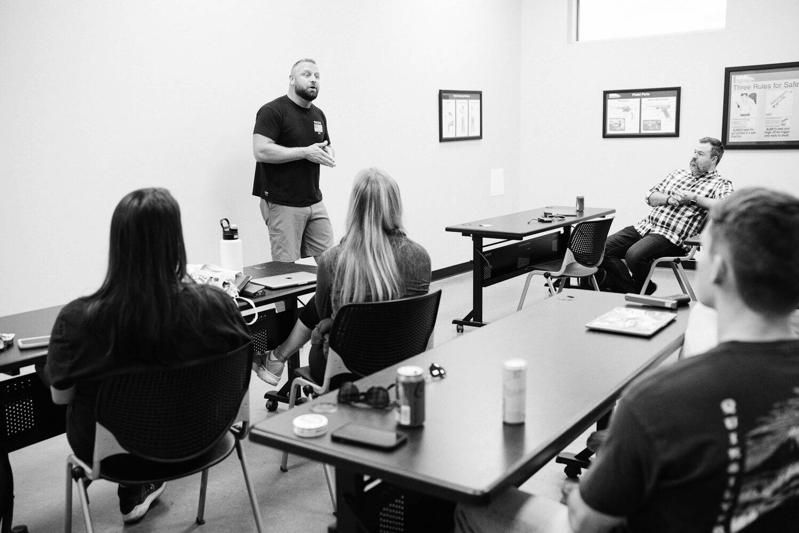 Ballistic team presenting during a strategy session in the conference room